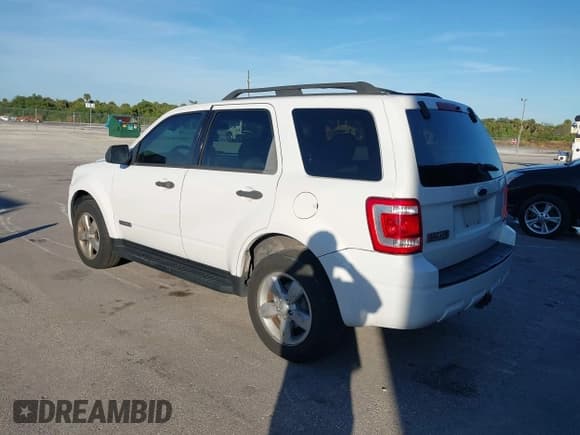 ✅ 2008 Ford Escape XLT • VIN: 1FMCU03118KB52757 • Lot: 43856341. Listed on IAAI with 154,029 mi. Free auction sales archive from the USA and detailed vehicle history report at DreamBid. Image 3.