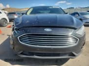 ✅ 2020 Ford Fusion SE • VIN: 3FA6P0HD9LR255379 • Lot: 85760935. Wystawiony na Copart z przebiegiem 184 173 mil. Bezpłatny archiwum sprzedaży aukcyjnych z USA i szczegółowy raport historii pojazdu na DreamBid. Zdjęcie 5.