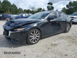 ✅ 2020 Mazda 3 Select • VIN: 3MZBPBCM1LM126025 • Lot: 84834525. Listed on Copart with 68,125 mi. Free auction sales archive from the USA and detailed vehicle history report at DreamBid. Image 1.