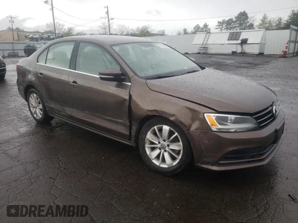✅ 2015 Volkswagen Jetta SE • VIN: 3VWD17AJ1FM422960 • Lot: 55860335. Listed on Copart with 87,616 mi. Free auction sales archive from the USA and detailed vehicle history report at DreamBid. Image 4.