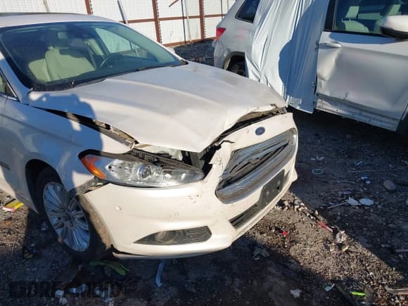 ✅ 2014 Ford Fusion Titanium • VIN: 3FA6P0SU0ER357441 • Lot: 43792306. Listed on IAAI with 191,144 mi. Free auction sales archive from the USA and detailed vehicle history report at DreamBid. Image 6.