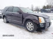 ✅ 2009 Cadillac SRX AWD • VIN: 1GYEE437390112841 • Lot: 41317070. Wystawiony na IAAI z przebiegiem 139 513 mil. Bezpłatny archiwum sprzedaży aukcyjnych z USA i szczegółowy raport historii pojazdu na DreamBid. Zdjęcie 6.