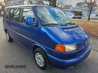 ✅ 1999 Volkswagen EuroVan • VIN: WV2MH2703XH035849 • Лот: 41776025. Опубликован ранее на Copart с пробегом 261 952 миль. Бесплатный доступ к архиву аукционных продаж из США и подробный отчёт об истории автомобиля на DreamBid. Изображение 1.