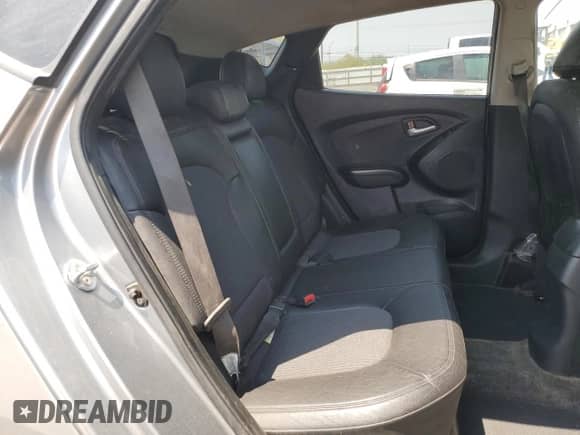 2013 Hyundai Tucson GLS z VIN KM8JU3AC9DU713671, wystawiony jako Copart lot #64999045 z przebiegiem 69 751 mil mil oraz Szkoda całkowita • Salvage title. Historia ofert i sprzedaży dostępna na DreamBid. Obrazek 11.