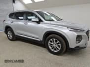 ✅ 2019 Hyundai Santa Fe SE • VIN: 5NMS23AD4KH020406 • Лот: 56236005. Опубликован ранее на Copart с пробегом 107 972 миль. Бесплатный доступ к архиву аукционных продаж из США и подробный отчёт об истории автомобиля на DreamBid. Изображение 4.