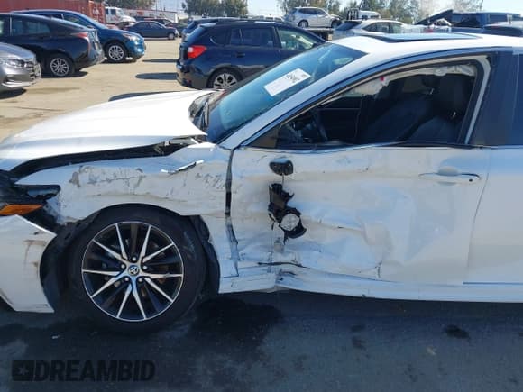 ✅ 2022 Toyota Camry Hybrid SE • VIN: 4T1S31AKXNU585302 • Lot: 43654902. Listed on IAAI with 59,101 mi. Free auction sales archive from the USA and detailed vehicle history report at DreamBid. Image 6.