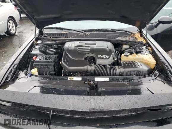 ✅ 2013 Dodge Challenger SXT • VIN: 2C3CDYAG6DH692475 • Lot: 82347434. Wystawiony na Copart z przebiegiem 247 466 mil. Bezpłatny archiwum sprzedaży aukcyjnych z USA i szczegółowy raport historii pojazdu na DreamBid. Zdjęcie 11.