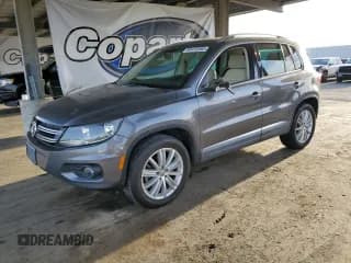 ✅ 2013 Volkswagen Tiguan S • VIN: WVGBV3AX9DW576272 • Lot: 92412365. Listed on Copart with 192,035 mi. Free auction sales archive from the USA and detailed vehicle history report at DreamBid. Image 1.