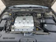 ✅ 2000 Cadillac DeVille • VIN: 1G6KF5794YU249059 • Lot: 71614494. Listed on Copart with 121,611 mi. Free auction sales archive from the USA and detailed vehicle history report at DreamBid. Image 11.