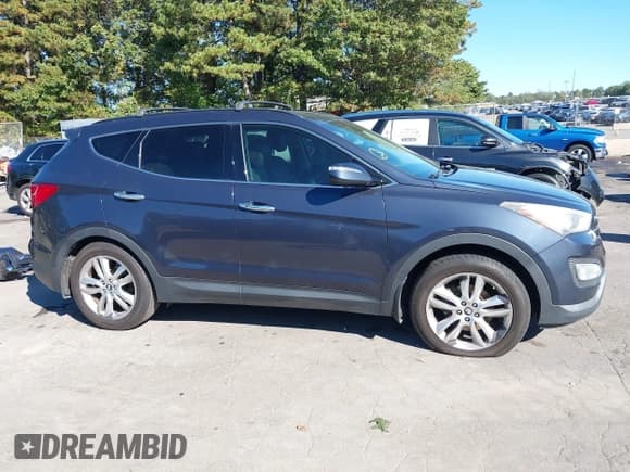 ✅ 2013 Hyundai Santa Fe Sport • VIN: 5XYZU3LA4DG099729 • Lot: 43463958. Listed on IAAI with 164,931 mi. Free auction sales archive from the USA and detailed vehicle history report at DreamBid. Image 12.