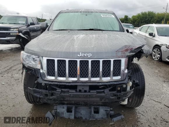 ✅ 2013 Jeep Grand Cherokee Laredo • VIN: 1C4RJFAG5DC559857 • Lot: 85663295. Listed on Copart with 181,585 mi. Free auction sales archive from the USA and detailed vehicle history report at DreamBid. Image 5.