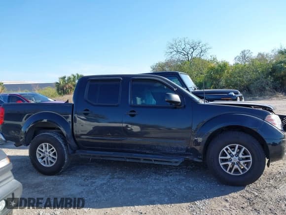 ✅ 2019 Nissan Frontier SL • VIN: 1N6AD0ER4KN773783 • Lot: 41632094. Listed on IAAI with 142,026 mi. Free auction sales archive from the USA and detailed vehicle history report at DreamBid. Image 13.