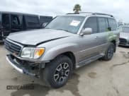 ✅ 2001 Toyota Land Cruiser • VIN: JTEHT05J712000848 • Lot: 42057327. Listed on IAAI with 281,441 mi. Free auction sales archive from the USA and detailed vehicle history report at DreamBid. Image 2.