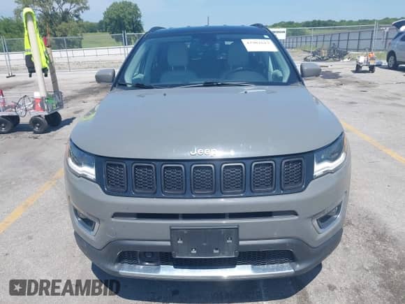 2021 Jeep Compass Limited with VIN 3C4NJDCBXMT596279, listed as a IAAI auction lot 42982613 with 52,886 mi miles and . Bid and sale history available at DreamBid. Image 12.