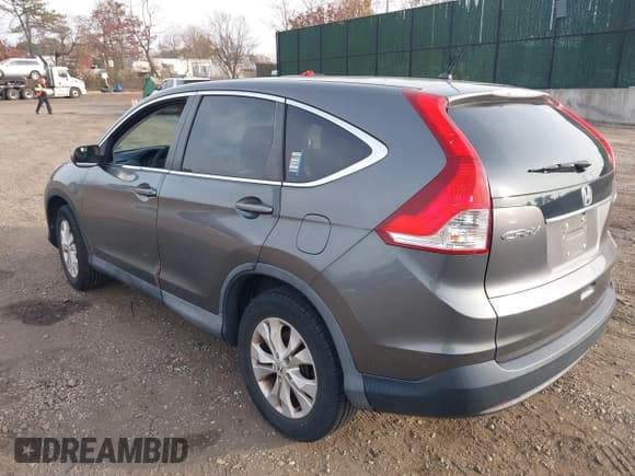 ✅ 2014 Honda CR-V EX • VIN: 2HKRM4H54EH690333 • Lot: 43637097. Listed on IAAI with 102,028 mi. Free auction sales archive from the USA and detailed vehicle history report at DreamBid. Image 3.