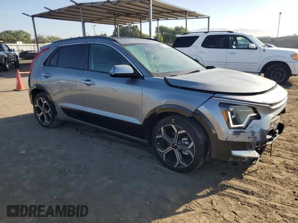 ✅ 2023 Kia Niro SX Touring • VIN: KNDCR3LF7P5052338 • Lot: 75649254. Wystawiony na Copart z przebiegiem 11 919 mil. Bezpłatny archiwum sprzedaży aukcyjnych z USA i szczegółowy raport historii pojazdu na DreamBid. Zdjęcie 4.