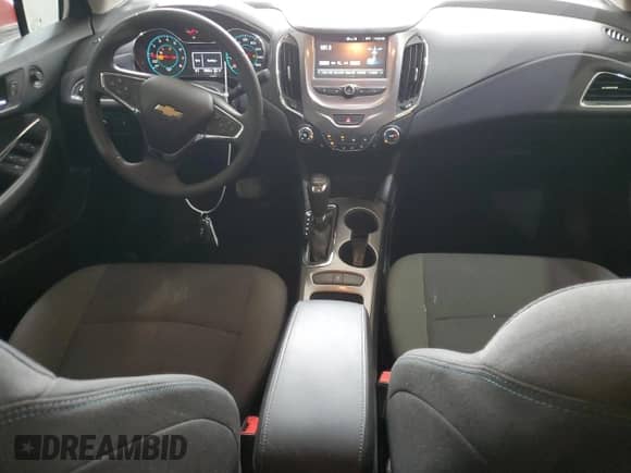 2018 Chevrolet Cruze LT z VIN 1G1BE5SM6J7130373, wystawiony jako Copart lot #70095855 z przebiegiem 135 592 mil mil oraz Szkoda całkowita • Salvage title. Historia ofert i sprzedaży dostępna na DreamBid. Obrazek 8.