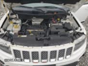 ✅ 2017 Jeep Compass Latitude • VIN: 1C4NJCEA7HD207088 • Lot: 82153285. Listed on Copart with 141,091 mi. Free auction sales archive from the USA and detailed vehicle history report at DreamBid. Image 12.