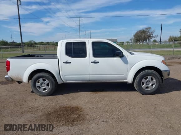 ✅ 2008 Nissan Frontier SE • VIN: 1N6AD07U48C451733 • Lot: 43896353. Listed on IAAI with 184,799 mi. Free auction sales archive from the USA and detailed vehicle history report at DreamBid. Image 13.