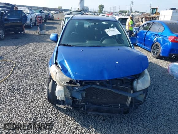 ✅ 2013 Suzuki SX4 LE • VIN: JS2YC5A36D6101505 • Lot: 42485012. Wystawiony na IAAI z przebiegiem 123 922 mil. Bezpłatny archiwum sprzedaży aukcyjnych z USA i szczegółowy raport historii pojazdu na DreamBid. Zdjęcie 13.