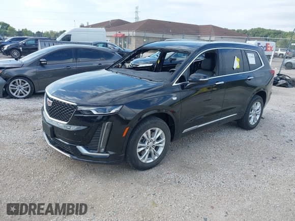 ✅ 2022 Cadillac XT6 Luxury • VIN: 1GYKPBR42NZ117730 • Lot: 43240068. Listed on IAAI with 56,043 mi. Free auction sales archive from the USA and detailed vehicle history report at DreamBid. Image 2.