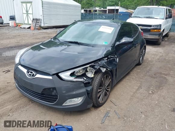 ✅ 2013 Hyundai Veloster w/Gray Int • VIN: KMHTC6AD6DU105953 • Lot: 42452440. Listed on IAAI with 141,710 mi. Free auction sales archive from the USA and detailed vehicle history report at DreamBid. Image 2.