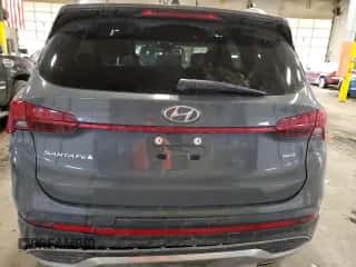 2022 Hyundai Santa Fe SEL z VIN 5NMS3DAJ2NH430411, wystawiony jako Copart lot #69762502 z przebiegiem 9 920 mil mil oraz . Historia ofert i sprzedaży dostępna na DreamBid. Obrazek 6.