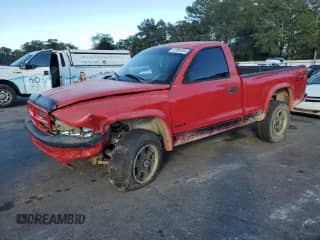 2003 Dodge Dakota with VIN 1D7GG16X73S202269, listed as a Copart auction lot 81954304 with Not provided miles and Salvage title. Bid and sale history available at DreamBid. Image 1.