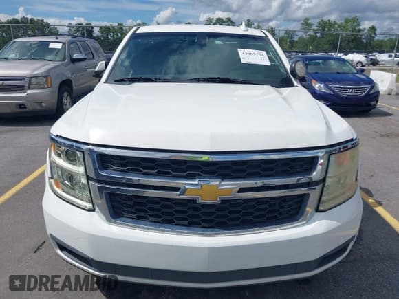 ✅ 2015 Chevrolet Tahoe Commercial • VIN: 1GNLC2EC4FR590301 • Lot: 43005734. Listed on IAAI with 208,347 mi. Free auction sales archive from the USA and detailed vehicle history report at DreamBid. Image 12.