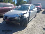 ✅ 2012 Kia Forte EX • VIN: KNAFU4A28C5633372 • Лот: 43343088. Опубликован ранее на IAAI с пробегом 148 756 миль. Бесплатный доступ к архиву аукционных продаж из США и подробный отчёт об истории автомобиля на DreamBid. Изображение 2.