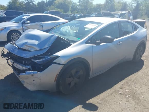 ✅ 2023 Toyota Prius LE • VIN: JTDACAAU2P3004496 • Lot: 43164149. Wystawiony na IAAI z przebiegiem 54 818 mil. Bezpłatny archiwum sprzedaży aukcyjnych z USA i szczegółowy raport historii pojazdu na DreamBid. Zdjęcie 2.