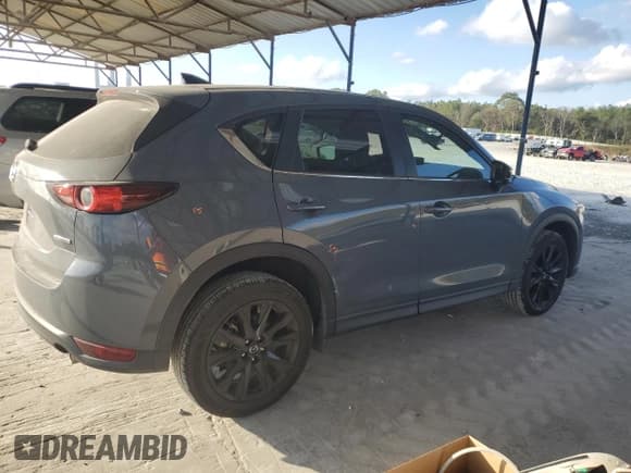 ✅ 2021 Mazda CX-5 Carbon Edition • VIN: JM3KFACM9M0348565 • Lot: 80429184. Wystawiony na Copart z przebiegiem 30 980 mil. Bezpłatny archiwum sprzedaży aukcyjnych z USA i szczegółowy raport historii pojazdu na DreamBid. Zdjęcie 3.