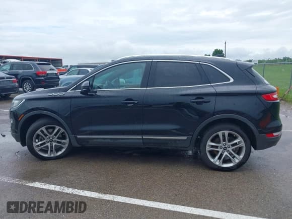 ✅ 2018 Lincoln MKC Reserve • VIN: 5LMCJ3D98JUL33084 • Lot: 42505440. Wystawiony na IAAI z przebiegiem 72 202 mil. Bezpłatny archiwum sprzedaży aukcyjnych z USA i szczegółowy raport historii pojazdu na DreamBid. Zdjęcie 14.