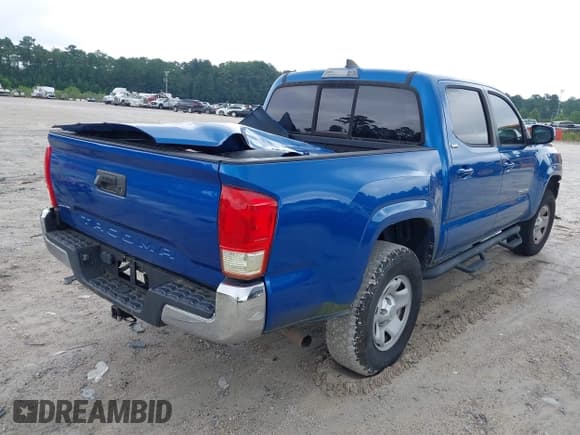 ✅ 2017 Toyota Tacoma SR • VIN: 5TFAX5GN4HX094028 • Lot: 43014311. Listed on IAAI with 70,833 mi. Free auction sales archive from the USA and detailed vehicle history report at DreamBid. Image 4.