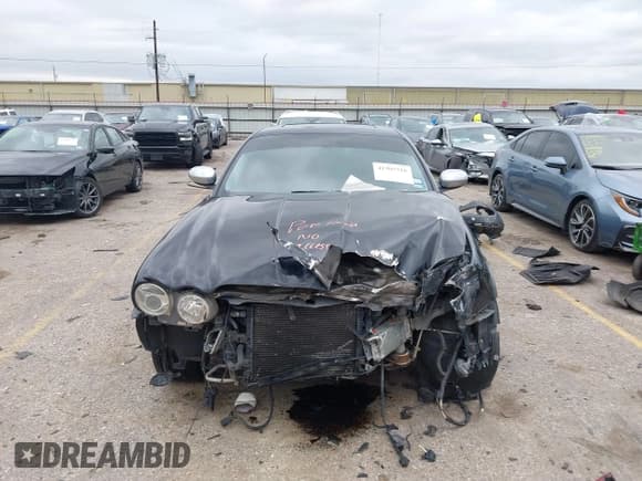 ✅ 2007 Jaguar XJ • VIN: SAJXA73C97TH14362 • Lot: 41305716. Listed on IAAI with 120,924 mi. Free auction sales archive from the USA and detailed vehicle history report at DreamBid. Image 12.