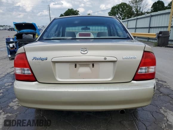 ✅ 2002 Mazda Protege DX • VIN: JM1BJ225821608503 • Lot: 53307285. Wystawiony na Copart z przebiegiem 281 283 mil. Bezpłatny archiwum sprzedaży aukcyjnych z USA i szczegółowy raport historii pojazdu na DreamBid. Zdjęcie 6.