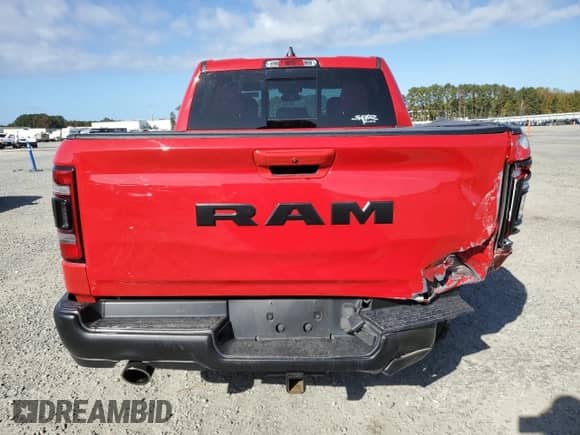 2020 Ram 1500 Rebel с VIN 1C6RRELT4LN320355, выставлен на аукционе Copart как лот 78524884 с пробегом 67 616 миль миль и Списание • Salvage title. История ставок и продаж доступна на DreamBid. Изображение 6.
