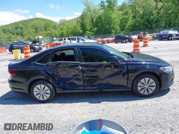 ✅ 2019 Volkswagen Jetta S • VIN: 3VWC57BU8KM090633 • Лот: 42164977. Опубликован ранее на IAAI с пробегом 78 348 миль. Бесплатный доступ к архиву аукционных продаж из США и подробный отчёт об истории автомобиля на DreamBid. Изображение 13.