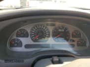 ✅ 2003 Ford Mustang Premium Mach 1 • VIN: 1FAFP42R43F450797 • Lot: 52409585. Wystawiony na Copart z przebiegiem Nie podano. Bezpłatny archiwum sprzedaży aukcyjnych z USA i szczegółowy raport historii pojazdu na DreamBid. Zdjęcie 9.