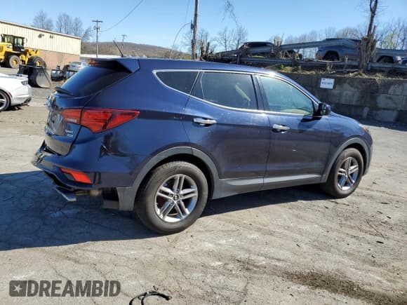 ✅ 2018 Hyundai Santa Fe 2.4L • VIN: 5XYZTDLB1JG514440 • Лот: 50703004. Опубликован ранее на Copart с пробегом 92 545 миль. Бесплатный доступ к архиву аукционных продаж из США и подробный отчёт об истории автомобиля на DreamBid. Изображение 3.
