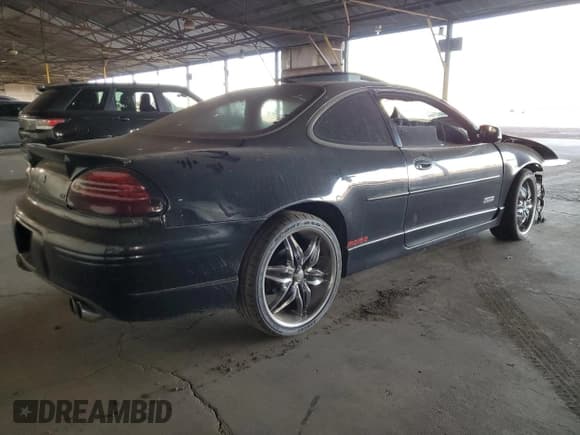 ✅ 2001 Pontiac Grand Prix GTP • VIN: 1G2WR12131F213703 • Лот: 82288354. Опубликован ранее на Copart с пробегом 144 585 миль. Бесплатный доступ к архиву аукционных продаж из США и подробный отчёт об истории автомобиля на DreamBid. Изображение 3.