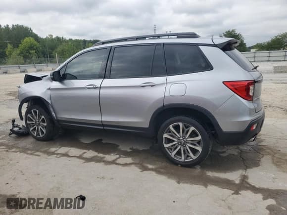 ✅ 2019 Honda Passport Elite • VIN: 5FNYF8H02KB008416 • Лот: 69929725. Опубликован ранее на Copart с пробегом 105 510 миль. Бесплатный доступ к архиву аукционных продаж из США и подробный отчёт об истории автомобиля на DreamBid. Изображение 2.