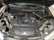 ✅ 2015 BMW X5 M • VIN: 5YMKT6C58F0C89657 • Lot: 77462264. Listed on Copart with 110,706 mi. Free auction sales archive from the USA and detailed vehicle history report at DreamBid. Image 12.