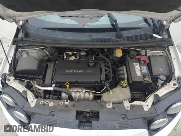 2015 Chevrolet Sonic LT z VIN 1G1JC5SHXF4103013, wystawiony jako Copart lot #71414114 z przebiegiem 169 575 mil mil oraz Szkoda całkowita • Salvage title. Historia ofert i sprzedaży dostępna na DreamBid. Obrazek 12.