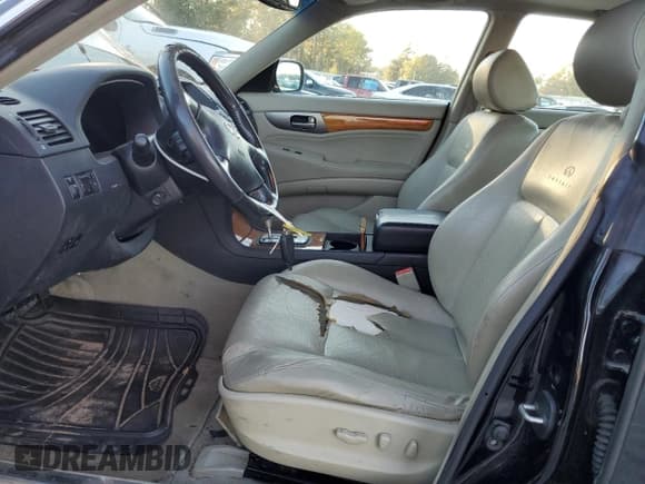 ✅ 2003 Infiniti M • VIN: JNKAY41E43M002876 • Lot: 85102004. Listed on Copart with 99,485 mi. Free auction sales archive from the USA and detailed vehicle history report at DreamBid. Image 7.