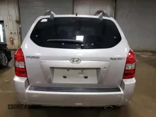 2005 Hyundai Tucson GL z VIN KM8JM12B25U074044, wystawiony jako Copart lot #77899464 z przebiegiem 126 950 mil mil oraz Szkoda całkowita • Salvage title. Historia ofert i sprzedaży dostępna na DreamBid. Obrazek 6.