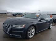 ✅ 2018 Audi A5 Premium Plus • VIN: WAUTNAF56JA049039 • Lot: 41868983. Listed on IAAI with 81,551 mi. Free auction sales archive from the USA and detailed vehicle history report at DreamBid. Image 2.