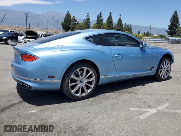 ✅ 2022 Bentley Continental GT GT V8 • VIN: SCBCG2ZG4NC094932 • Lot: 64056355. Listed on Copart with 6,596 mi. Free auction sales archive from the USA and detailed vehicle history report at DreamBid. Image 3.