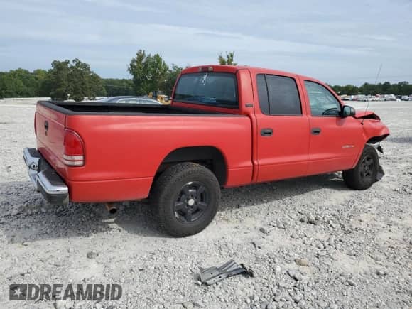 2001 Dodge Dakota Sport with VIN 1B7GL2AX51S193278, listed as a Copart auction lot 70592784 with 252,944 mi miles and Salvage title. Bid and sale history available at DreamBid. Image 3.
