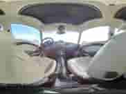 2012 MINI Hardtop with VIN WMWSU3C52CT367682, listed as a Copart auction lot 63045965 with 124,683 mi miles and Salvage title. Bid and sale history available at DreamBid. Image 14.